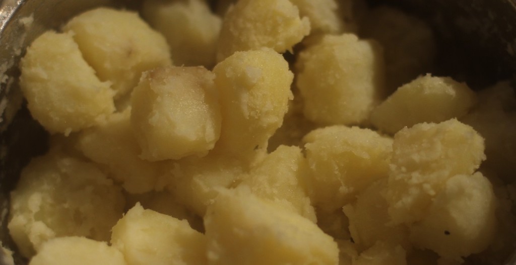 Potatoes fluffed ready for roasting
